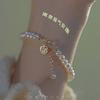 Pulseira de Bolas de Sino de Jade Hetian Nova 2025 Design de Nicho Ins Pulseira Feminina de Luxo de Alta Qualidade com um Senso de Elegância e Boa Sorte