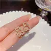 Pendientes de oso de perlas simples, dulces y delicados de estilo coreano, diseño de nicho, explosión exquisita, joyería para orejas única y versátil
