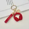 Llavero de Audífonos con Pedrería de Cristal Llavero Musical Completamente Cubierto de Pedrería Adorno Colgante de Cuerda de Diamante para Bolso Accesorios Llavero de Coche
