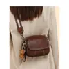 Bolso de Mujer 2026 Nuevo Estilo Bolso de Mujer Otoño/Invierno Piel Genuina Bolso Redondo Pequeño de Hombro Individual Sensación de Alta Gama Bolso Cruzado para Teléfono