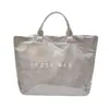 Bolsa de Mão Tote Bag de Verão 2026 Novo Estilo Texturizada em PU Cor Brilhante Bolsa Grande Fashionável Tendência com Letras Estilo Europeu e Americano