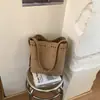 2026 Nuevo Estilo Ins Nicho Tallado Hueco Bolso de Mano Tipo Cubo Moda Casual Simple Hombro Cruzado Bolso de Mujer