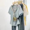 Moda Verão 2026 Nova Roupa Feminina Plus Size, Blusa Camiseta Oversized Elegante que Reduz a Idade com Manga Curta para Mulheres A11431