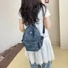 Mochila Casual Simple de Mezclilla para Mujer 2026 Nueva Ligera Versátil Mochila para Viajes Diarios Estilo Universitario Bolsa Escolar Pequeña