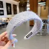 Faixa de cabeça de tricô francesa retrô feminina para cabelo, faixa de cabeça de lã para viagem, acessório de cabelo simples de celebridade da internet, grampo de cabelo de pressão para sair da Coreia do Sul
