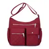 Bolsa transversal de nylon de grande capacidade, novo estilo para mulheres, bolsa de ombro popular para mulheres de meia-idade, bolsa casual para mães, bolsa de tecido 2026