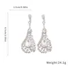 Pendientes Largos de Plata con Tachuelas y Diamantes en Forma de Gota de Agua, Pendientes Vintage de Estilo de Corte para Mujer, Lujo Ligero, Pendientes de Alta Gama con un Diseño Único