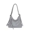 Bolso de axila de cuero suave estilo casual para mujer, diseño único, nuevo bolso tote 2026, versátil para ir al trabajo y el ocio, bolso cruzado