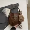 Bolso de diseño nicho coreano para mujer, nuevo bolso cubo vintage elegante, bolso de hombro y bandolera de alta gama para el día a día