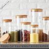 Suministro directo del fabricante tarro hermético de vidrio de borosilicato alto de grado alimenticio tarro hermético de cocina tarro de almacenamiento de vidrio con tapa de madera