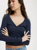 Camiseta de manga larga ajustada de color liso con cuello en V, jersey para mujer, de otoño, nueva, transfronteriza de Amazon Europa y América, con botones en la espalda, para mostrar el ombligo