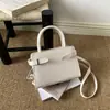 Bolsa de Ombro Cruzada à Mão Kelly Bag Retro Fashion Simples Versátil Estilosa Tendência Verão 2026