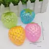 Juguete de apretar Caramelo de Malta de Fresa, Juguete Transparente con Purpurina para Alivio del Estrés, Q-Soft, Diseño Realista de Fruta, Gadget para Alivio del Estrés Infantil