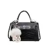 Bolso de Moda de Lujo de Gama Alta Nicho Coreano para Mujer, Bolso Versátil Estilo Coreano para el Trabajo y los Viajes, Bolso Kelly, Transfronterizo