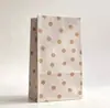 En stock Bolsa de papel kraft creativa desechable para galletas bolsa para envolver dulces fiesta de cumpleaños piel de vaca 6 Estilos