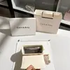 Dropshipping Bolsa Caixa Embossada de Nicho Estilo Francês 2026 Novo Modelo Primavera Bolsa Transversal Quadrada Pequena de Alto Padrão Atacado