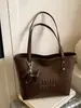 Bolsos Transfronterizos para Mujer 2025 Otoño Nuevo Versátil Color Sólido Letra Gran Capacidad Moda Viajero Bolso de Hombro Bolso Tote