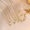 Collar con colgante pequeño de moda 26 letras inglesas acero de titanio oro de 18k cadena de clavícula simple versátil sin decoloración venta al por mayor