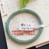 Pulsera de jadeíta azul de calidad premium con textura fina, suave y húmeda. Pulsera Dingdang. Pulsera Dingdang redonda de jadeíta, talla 54-61