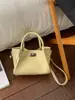 Exquisita y Compacta Bolsa Cesta de Verduras para Mujer 2026 Primavera Nueva Bolso de Hombro Cruzado de Cuero Suave Bolso de Mano para Viajes Diarios Bolso Cubo