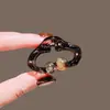 Presilha de garra pequena com laço de estampa de leopardo elegante para mulheres, acessório de cabelo versátil para penteados semi-presos, grampo de tubarão pequeno