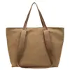 Bolsa de Pano Simples de Cor Sólida de Grande Capacidade Transfronteiriça para Trabalho e Deslocamento 2026 Nova Coleção de Primavera Tendência Moda Bolsa Tote Ombro Único