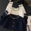 Cardigan de tricô com pontos coloridos estilo coreano para mulheres, novo modelo outono e inverno 2026, casaco suéter macio solto com gola redonda e color-blocking