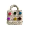 Ins hecho a mano tejido de ganchillo bola de pelo colorida para niños niña bolso de mano portátil accesorios bolsa para monedas de móvil venta al por mayor