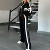 Outono 2026 Moda Casual Esportiva Europeia e Americana Nova Feminina Conjunto de Moletom Listrado Solto e Calças de Cintura Alta