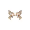 ¡Incrustado con piedras brillantes! Aretes de mariposa con clip de oro real de 18k bañado en circonita, aretes de estilo francés de lujo ligero, aretes de nicho al por mayor