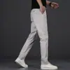 Pantalones casuales de corte recto ajustado de alta gama para hombre de Hong Kong, nuevos pantalones de negocios cómodos para otoño e invierno 2026