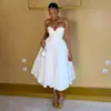 Ropa de mujer transfronteriza europea y americana 2026 otoño nuevo vestido midi línea A ceñido a la cintura sin tirantes y sin espalda dulce y elegante