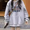 Sudadera gris para mujer, de longitud media, cubre las caderas, combinada con pantalones de tiburón, con capucha, nuevo estilo 2026, moda coreana, adecuada para figuras petite.