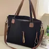 Venta al por mayor transfronteriza de bolsas de lona gruesa, estilo vintage y artísticas, con cremalleras, adecuadas para el uso diario a la moda, estudiantes y para llevar laptops.; se puede llevar como bolso de hombro o bolso cruzado