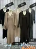 Traje de punto retro de alta gama para mujer, conjunto de dos piezas para otoño e invierno con chaqueta tipo chal combinada con un vestido de punto sin mangas