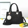 Bolsa feminina nova de verão 2021 estilo coreano acessórios pendurados ombro único PU bolsa feminina moda ombro único bolsa mensageiro