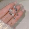 Pendientes de flores elegantes, de lujo y de moda, con diseño de alta gama y clip para oreja de mujer.