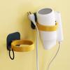 Soporte para secador de pelo sin perforaciones Estante de almacenamiento multifuncional para secador de pelo montado en la pared del baño Colgador de secador de pelo eléctrico montado en la pared de nuevo estilo