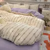 Nuevo juego de cuatro piezas jacquard teñido en hilo de alto peso, estilo simple y fresco, ropa de cama estilo princesa de lujo ligero