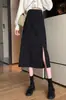 Falda de mujer, nueva primavera 2023, diseño de longitud media, estilo francés, cintura alta, abertura, negra, corte A, falda a la cadera