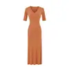 Vestido de estilo americano picante para mujer, cuello en V, abotonado, manga media, verano 2026, nuevo, francés, pura deseo, ajustado, bodycon, largo
