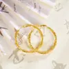 Brincos de Argola Torcidos de Camada Dupla Banhados a Ouro Vietnamita Acessórios de Orelha Versáteis Fabricante Atacadista de Acessórios de Joias Transfronteiriços Yiwu