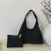 Bolso de axila de nicho para mujer 2026 Nuevo Otoño/Invierno Estilo coreano Moda Hueco Bolso de un solo hombro Versátil Bolso de mano para ir al trabajo