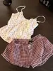 Pijama de tirantes con escote en V y lazo dulce y femenino para mujer, conjunto de dos piezas cómodo y casual de verano con shorts a cuadros para casa