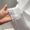 Playera de Manga Corta con Encaje Blanco para Mujer Verano 2025 Nueva Cuello Redondo Hombro Top con Borde de Oreja Camiseta Básica para Mujer