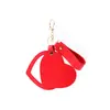Espejo de maquillaje en forma de corazón de cuero PU, espejo de mano mini redondo portátil, espejo de maquillaje apto para viajes, se puede personalizar con logotipo