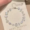 Pulseira colorida de strass em formato de estrela com design moderno, pulseira doce de nicho de luxo leve em estilo em camadas, pulseira de personalidade única
