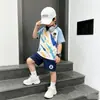 Conjunto de dos piezas de verano para niños de comercio exterior estilo coreano con estampado de velero de grafiti, pantalones de manga corta para niños, atuendo casual para el hogar para niños pequeños