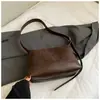 Bolsa Grande para Dumplings para Mulheres 2025 Inverno Nova Simples de Ombro Transversal Bolsa Quadrada Pequena para Alunos Aula Trabalho