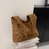 Bolso de Hombro Suede con Lunares Retro para Mujer 2026 Nueva Moda Gran Capacidad para Viajes Diarios Bolso Tote Simple